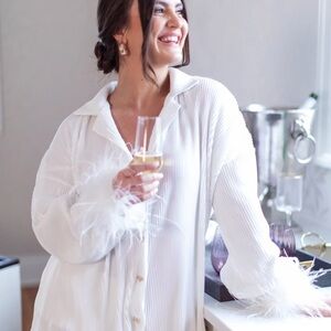 Waverles Detachable Feather Pleats Please set in Dove. Size M